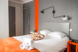 Cama o camas de una habitación en Mandarina Hotel Luxembourg Strassen