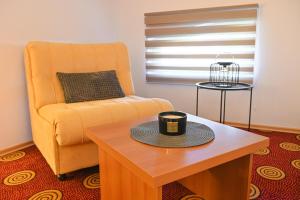 Posezení v ubytování Pirin rooms
