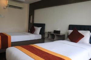 Rúm í herbergi á Hotel Kathmandu square
