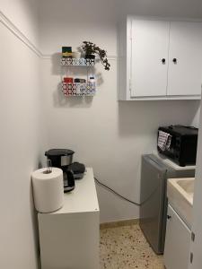 a kitchen with a coffee maker on a counter at ALEX house in Athens