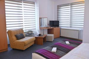 TV a/nebo společenská místnost v ubytování Pirin rooms
