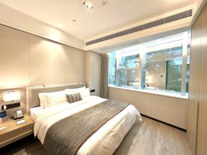Легло или легла в стая в CM Serviced Apartment Shenzhen Dongmen