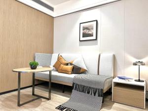 Кът за сядане в CM Serviced Apartment Shenzhen Dongmen
