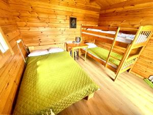Postel nebo postele na pokoji v ubytování Kuru Puhkemajad