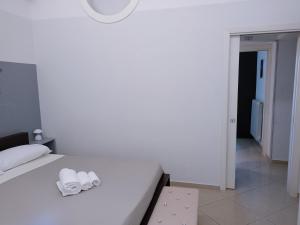 Postel nebo postele na pokoji v ubytování KiMia Home, Centro