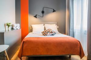 Cama o camas de una habitación en Mandarina Hotel Luxembourg Strassen