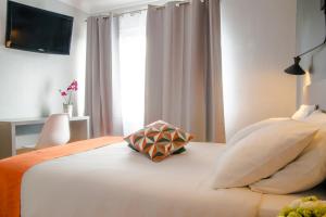 Cama o camas de una habitación en Mandarina Hotel Luxembourg Strassen