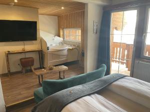 Voodi või voodid majutusasutuse Chalet Hotel Adler toas