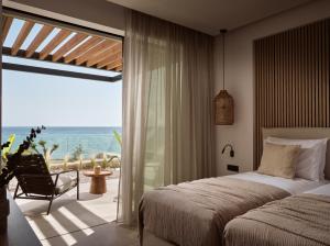 Letto o letti in una camera di Esthesis Beachfront Villas, with Heated Pool, By ThinkVilla