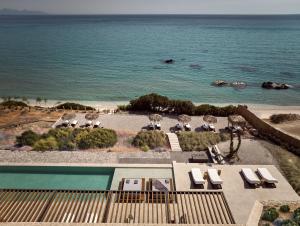 una vista sull'oceano da un resort con piscina di Esthesis Beachfront Villas, with Heated Pool, By ThinkVilla a Alykes