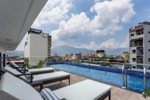Bazén v ubytování Hotel Lo Mustang nebo v jeho okolí + 37 fotografií