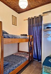 Voodi või voodid majutusasutuse LeMaMi Seafront Bungalows toas