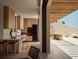 Cucina o angolo cottura di Esthesis Beachfront Villas, with Heated Pool, By ThinkVilla