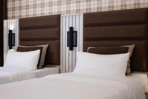 Postel nebo postele na pokoji v ubytování Hotel Innception