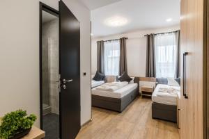 Postel nebo postele na pokoji v ubytování Hotel Montenegro