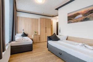 Postel nebo postele na pokoji v ubytování Hotel Montenegro