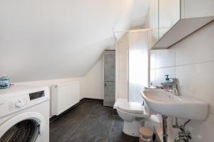 Kuchyň nebo kuchyňský kout v ubytování Ferienhaus Oase Balje + 29 fotografií