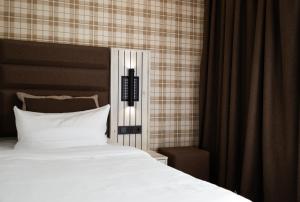 Postel nebo postele na pokoji v ubytování Hotel Innception