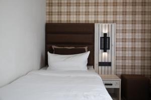 Postel nebo postele na pokoji v ubytování Hotel Innception