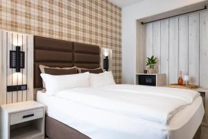 Postel nebo postele na pokoji v ubytování Hotel Innception