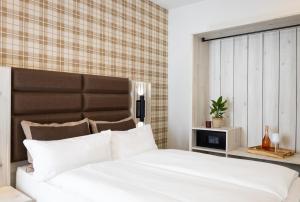 Postel nebo postele na pokoji v ubytování Hotel Innception
