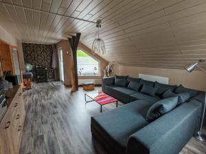 Posezení v ubytování Ferienwohnung Schmidt Werratal