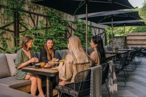 Goście zatrzymujący się w obiekcie 24 by AvenidA - Mountain Hotel