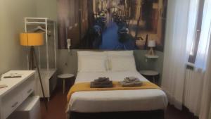 A bed or beds in a room at Stenghe Stracche