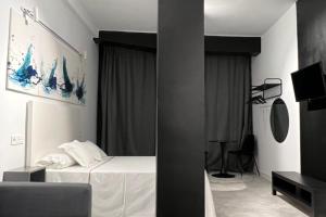 Postel nebo postele na pokoji v ubytování Innova Spaces Málaga