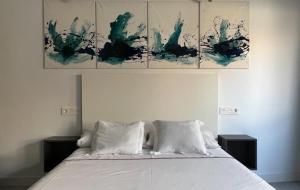 Postel nebo postele na pokoji v ubytování Innova Spaces Málaga