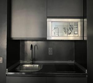 Kuchyň nebo kuchyňský kout v ubytování Innova Spaces Málaga