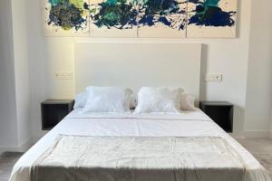 Postel nebo postele na pokoji v ubytování Innova Spaces Málaga