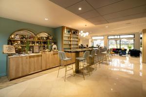 Nápoje v ubytování Best Western Hotel Le Quercy