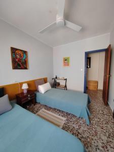 En eller flere senge i et værelse på Apartmento Tricolor Playa