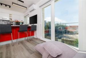 Et tv og/eller underholdning på Kings apartment