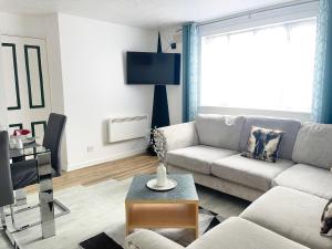 Posezení v ubytování Juniper Apartment - 2 Bedroom