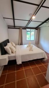 Letto o letti in una camera di Koh Mak Garden View