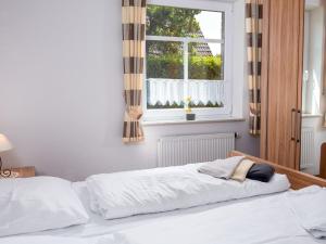 Ένα ή περισσότερα κρεβάτια σε δωμάτιο στο Apartment Osterriede by Interhome