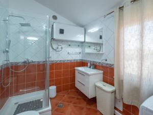 Koupelna v ubytování Holiday Home Aleksandra by Interhome