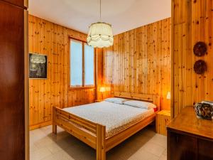 Ένα ή περισσότερα κρεβάτια σε δωμάτιο στο Holiday Home Casa Rita by Interhome