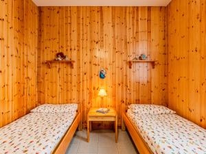Ένα ή περισσότερα κρεβάτια σε δωμάτιο στο Holiday Home Casa Rita by Interhome