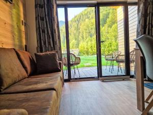 Posezení v ubytování Holiday Home Tiny Haus Glockenalm-Villa Maria by Interhome