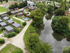 an aerial view of a village next to a river at Holiday Home Tiny Haus Heidi by Interhome in Beilngries