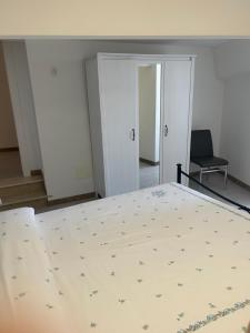 Postel nebo postele na pokoji v ubytování Casa Massinius