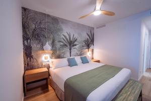Cama o camas de una habitación en Punta Candor Suites