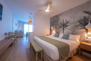 Cama o camas de una habitación en Punta Candor Suites