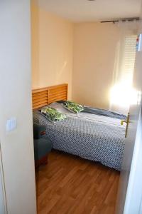 Voodi või voodid majutusasutuse Superb flat in recent building with parking lot toas