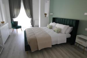 Postel nebo postele na pokoji v ubytování Villa Capodacqua