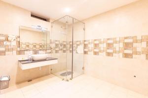 a bathroom with a sink and a shower at Buki Boutique Hotel Lazimpat in Kathmandu +28 photos