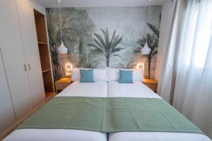Cama o camas de una habitación en Punta Candor Suites
